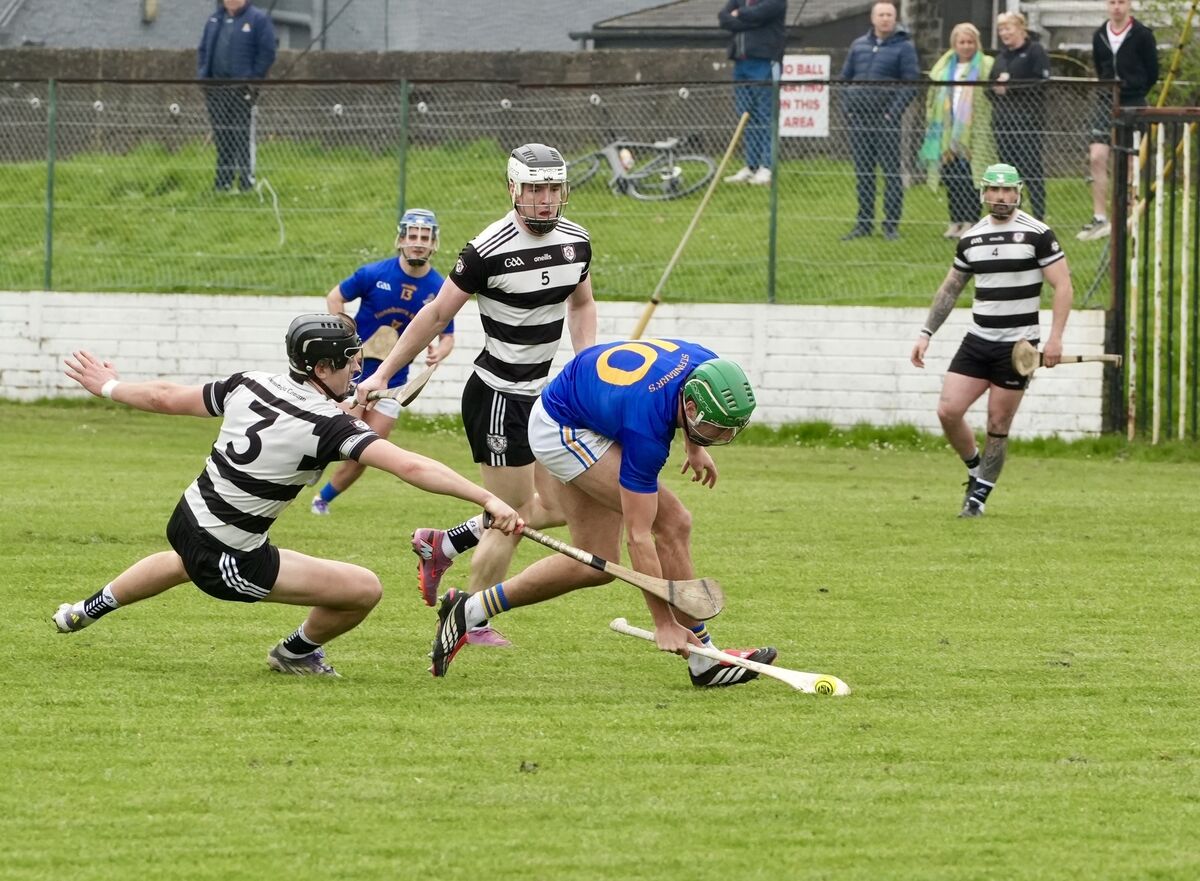 St Finbarr's Ben Cunningham under pressure from Tadhg O'Leary-Hayes and Evan McGrath. Picture: Noel Sweeney 