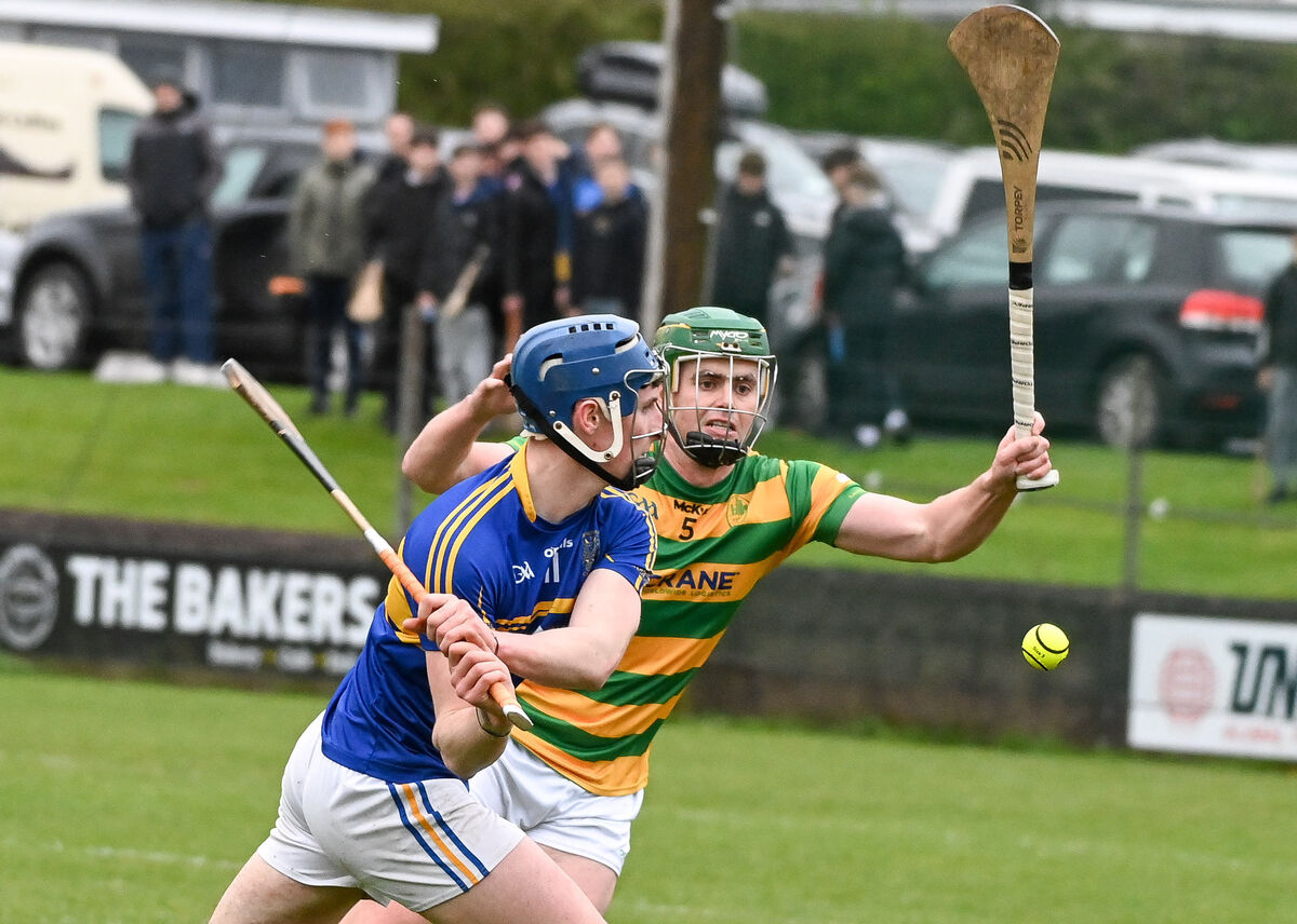  Carrigtwohill's Patrick Walsh scores a point past Blackrock's Cathal Cormack during their SHL clash at Carrigtwohill. Picture: David Keane.