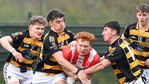 <p> Imokilly's Diarmaid Phelan is tackled by Avondhu's David Lardner. Picture: David Keane</p>
