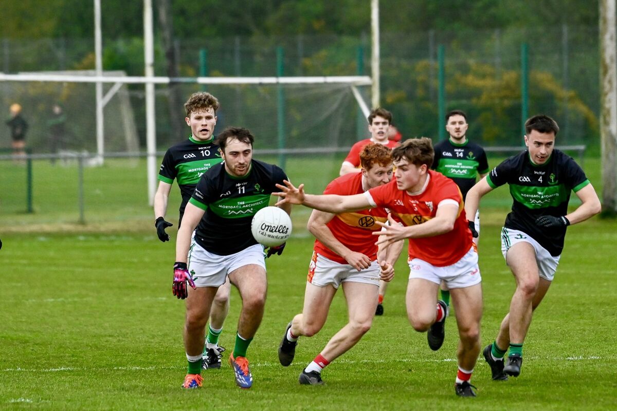 Nemo Rangers Ronan Dalton and Éire Óg's Colm Clifford in a tussle for possession during their league tie at Trabeg. Picture: Noel Sweeney