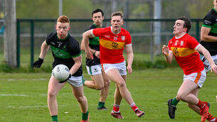 <p>Nemo Rangers Tim O’Brien moves the ball out of defence during their McCarthy Insurance Division One football league clash with Éire Óg at Trabeg. Picture: Noel Sweeney</p>