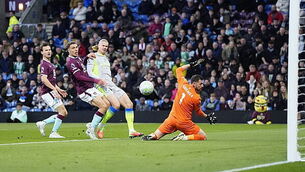 Man City climb to Premier League summit after victory relegates Burnley