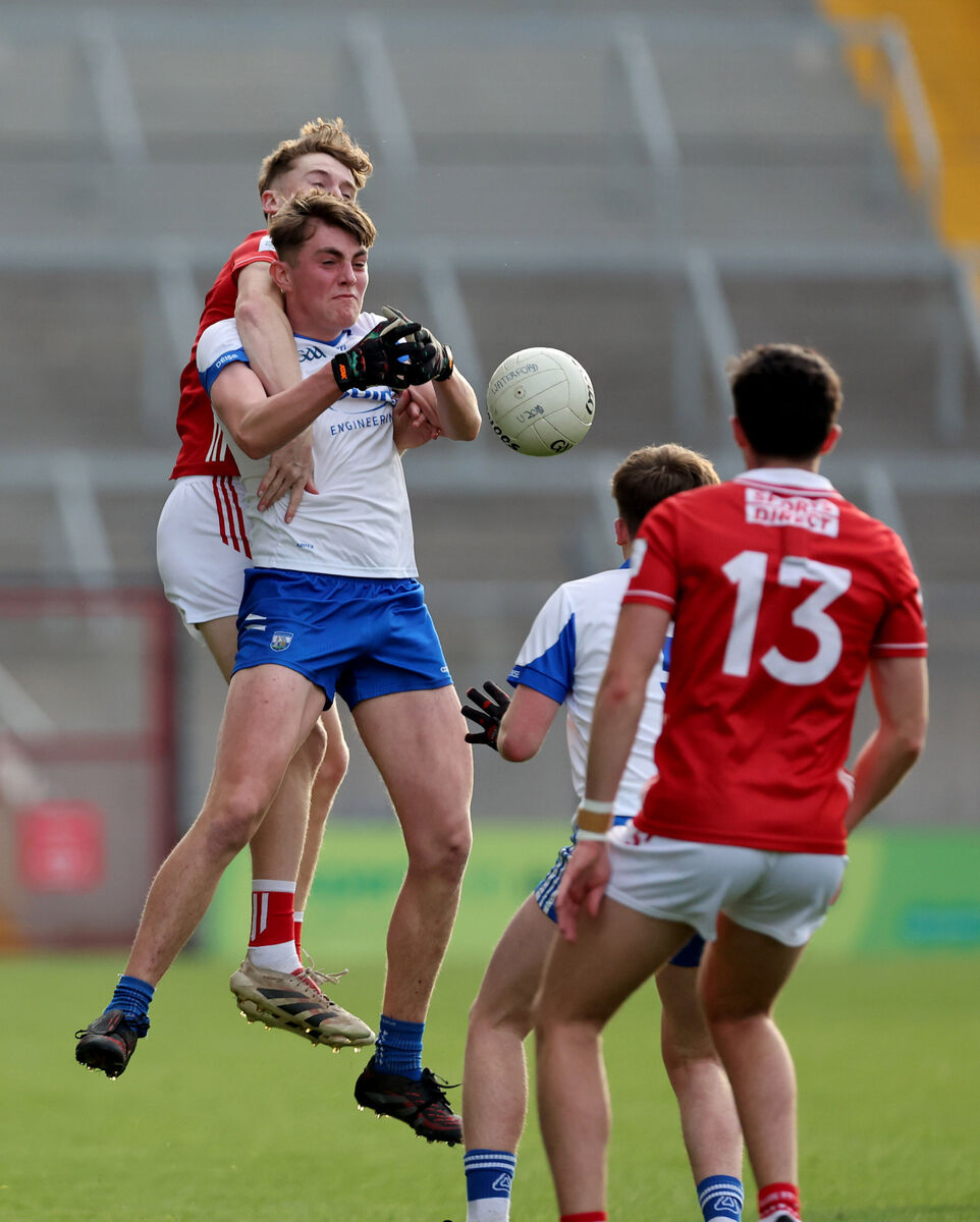  Mark O'Brien of Cork challenges for the ball with Diarmuid Mackle of Waterford. Picture: Jim Coughlan