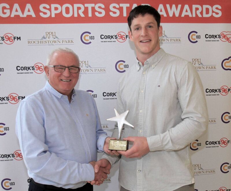 96FM/C103's Finbarr McCarthy presents the March award to Cork footballer Colm O'Callaghan. Picture: Tony O'Connell