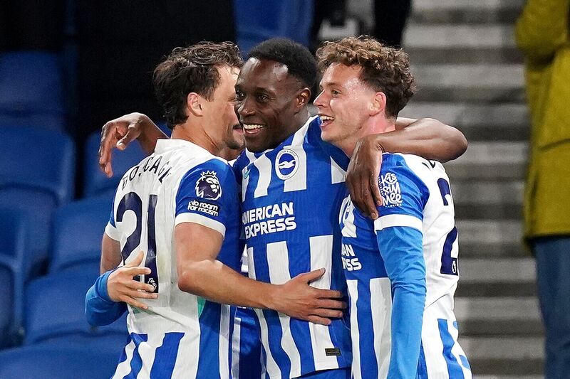 Brighton and Hove Albion's Danny Welbeck (centre) celebrates with team-mates after scoring their side's third goal during the Premier League match against Chelsea at the American Express Stadium, Brighton. Picture: Gareth Fuller/PA Wire