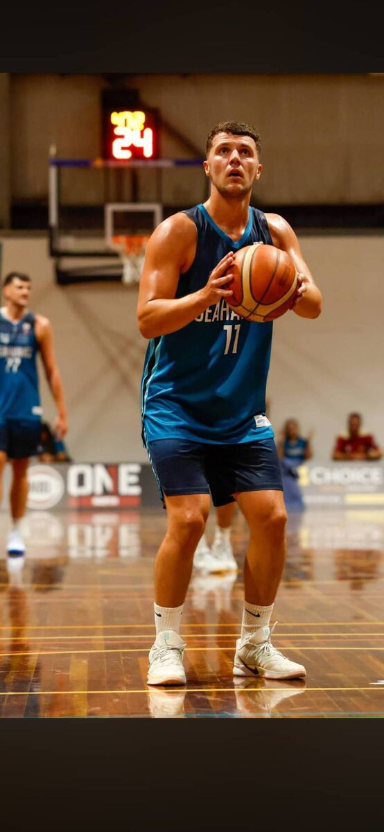 Former Neptune basketball star Conor O’Sullivan shooting a foul shot with his new team the North Gold Coast Seahawks at a recent game in Australia.