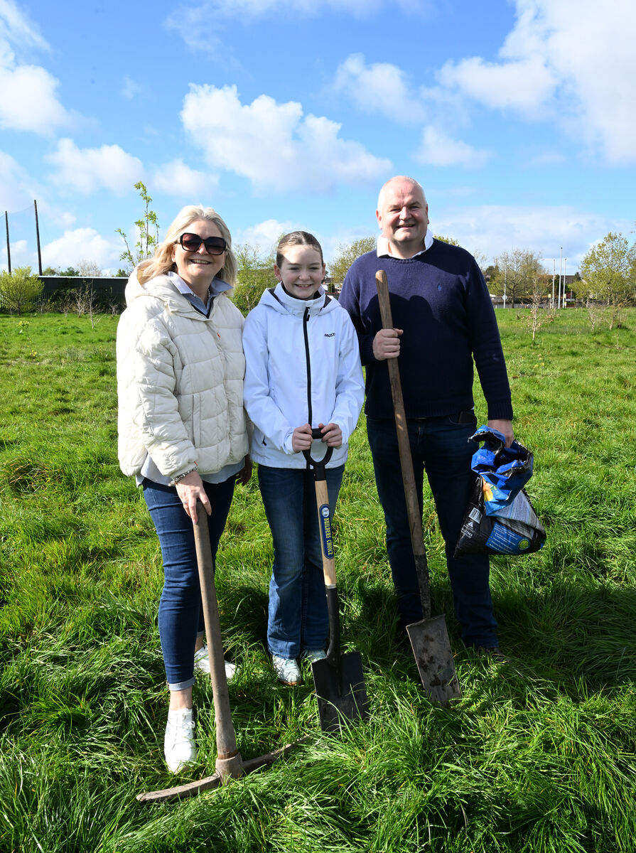 Alison, Leah and Colum Kelly at the planting event. Picture: Larry Cummins