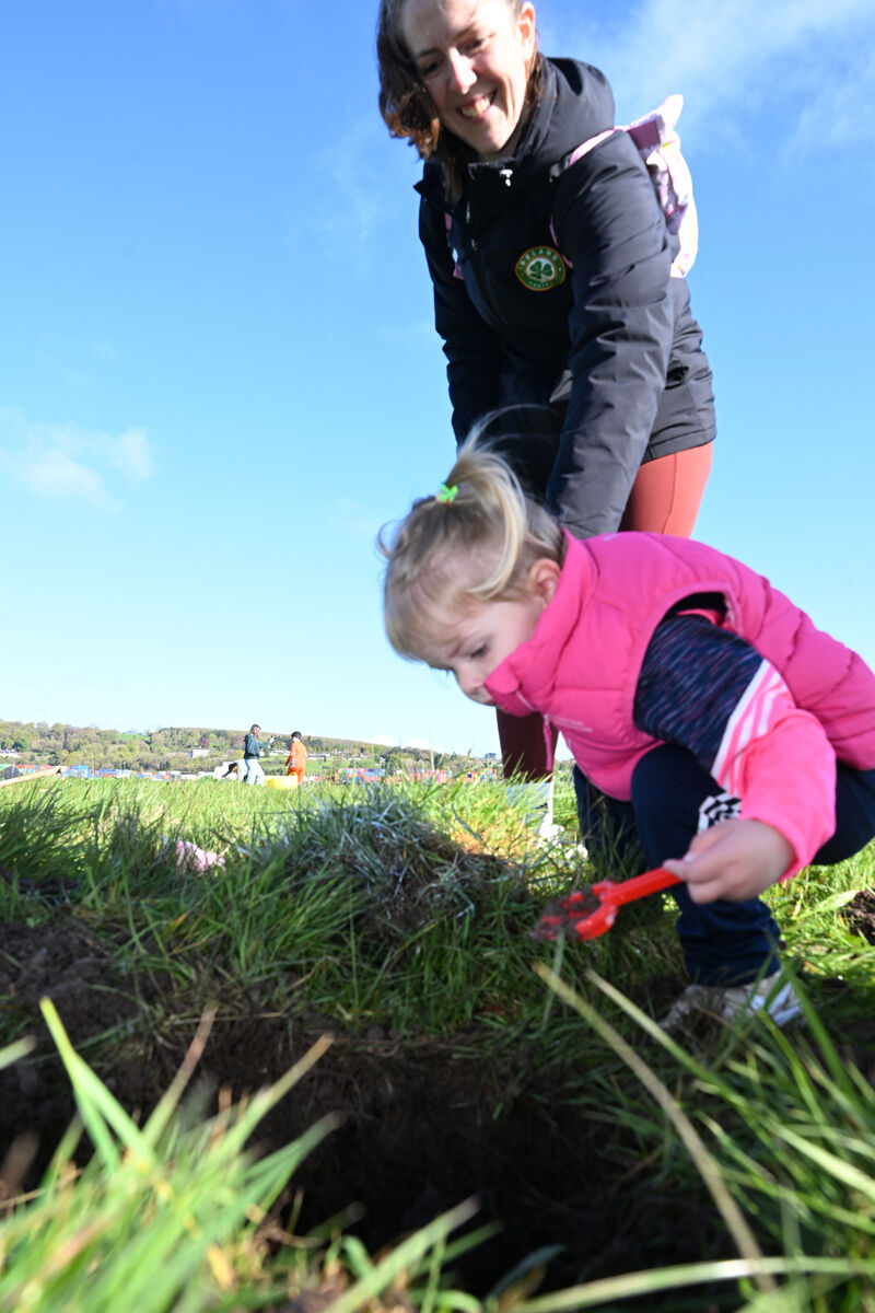Emily Gallagher was one of the youngest volunteers, with her mum Eileen at the planting event. Picture: Larry Cummins