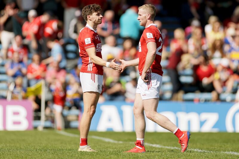 Cork's Ruairí Deane shakes hands with Paul Walsh after the game against Tipperary. Picture: INPHO/Laszlo Geczo