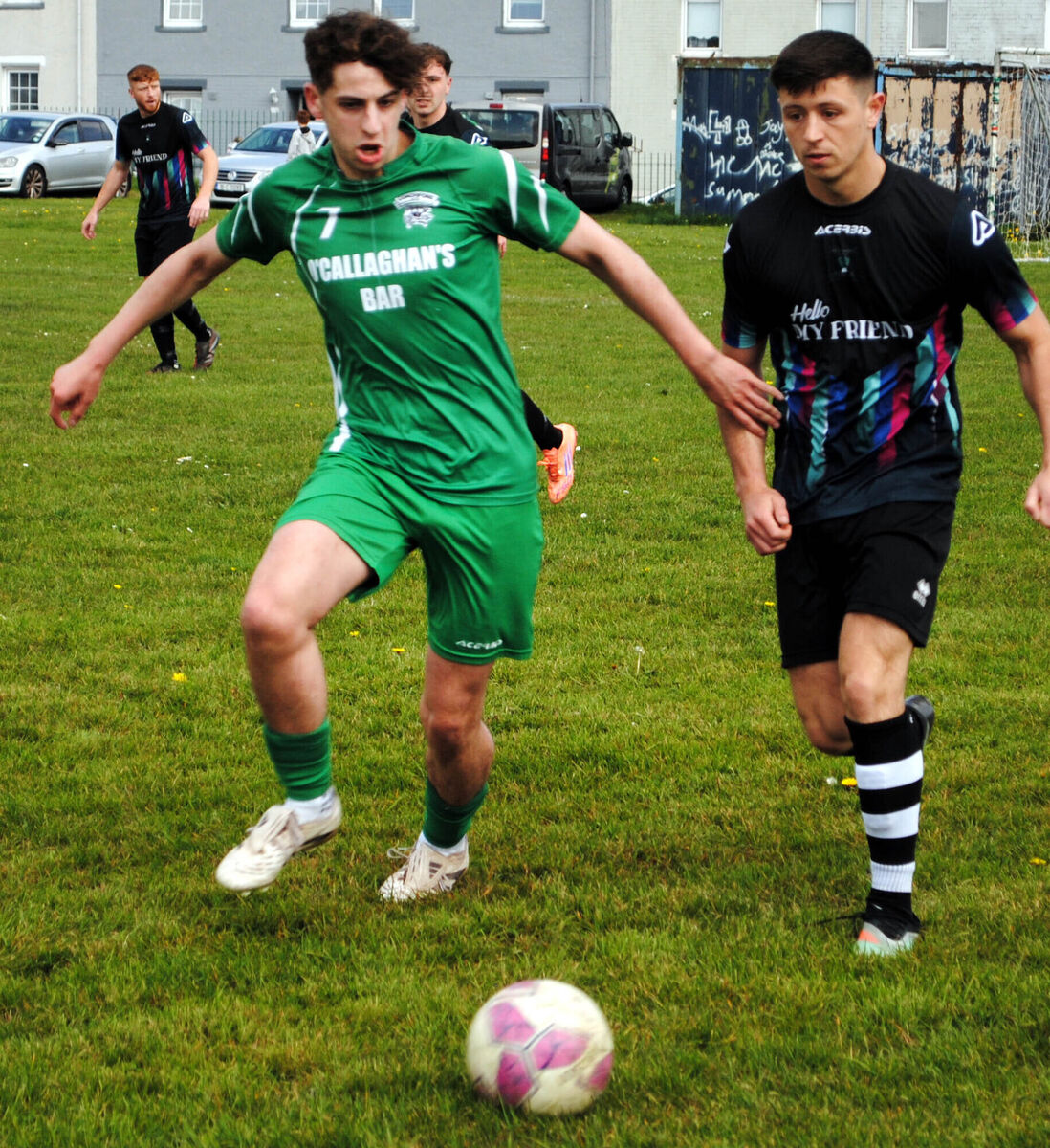 Coachford's Jack O'Sullivan and Knocknaheeny Celtic's Jack Leonard in a race for possession at Kilmore Road.