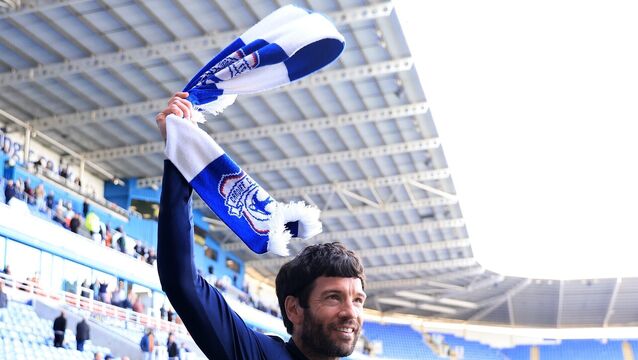<p>Cardiff City manager Brian Barry-Murphy celebrates securing promotion to the Sky Bet Championship</p>