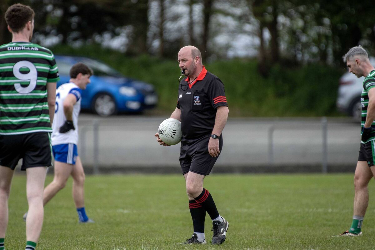 Referee Jerry Kelleher about to throw the ball in during Knocknagree v Douglas. Picture: Mark Nolan