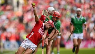 <p>Cork's William Buckley tries to get away from Barry Nash of Limerick during Sunday's Munster SHC game at SuperValu Páirc Uí Chaoimh. Picture: Tom Beary/Sportsfile</p>