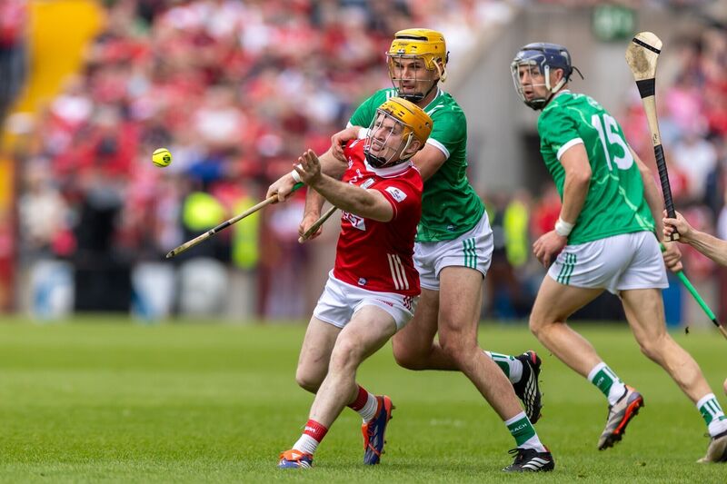 Cork’s Niall O'Leary passes away from Cathal O'Neill of Limerick. Picture: INPHO/Morgan Treacy