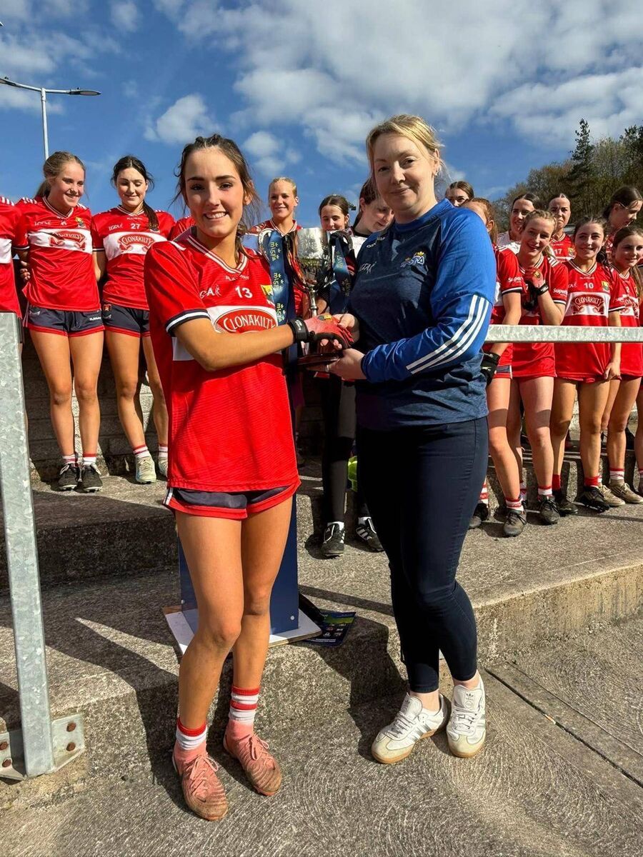 Cork captain Orla O'Brien is presented with the Munster U16 A cup by Munster LGFA president, Lorraine Royle. Cork captain Orla O'Brien is presented with the Munster U16 A cup by Munster LGFA president, Lorraine Royle.
