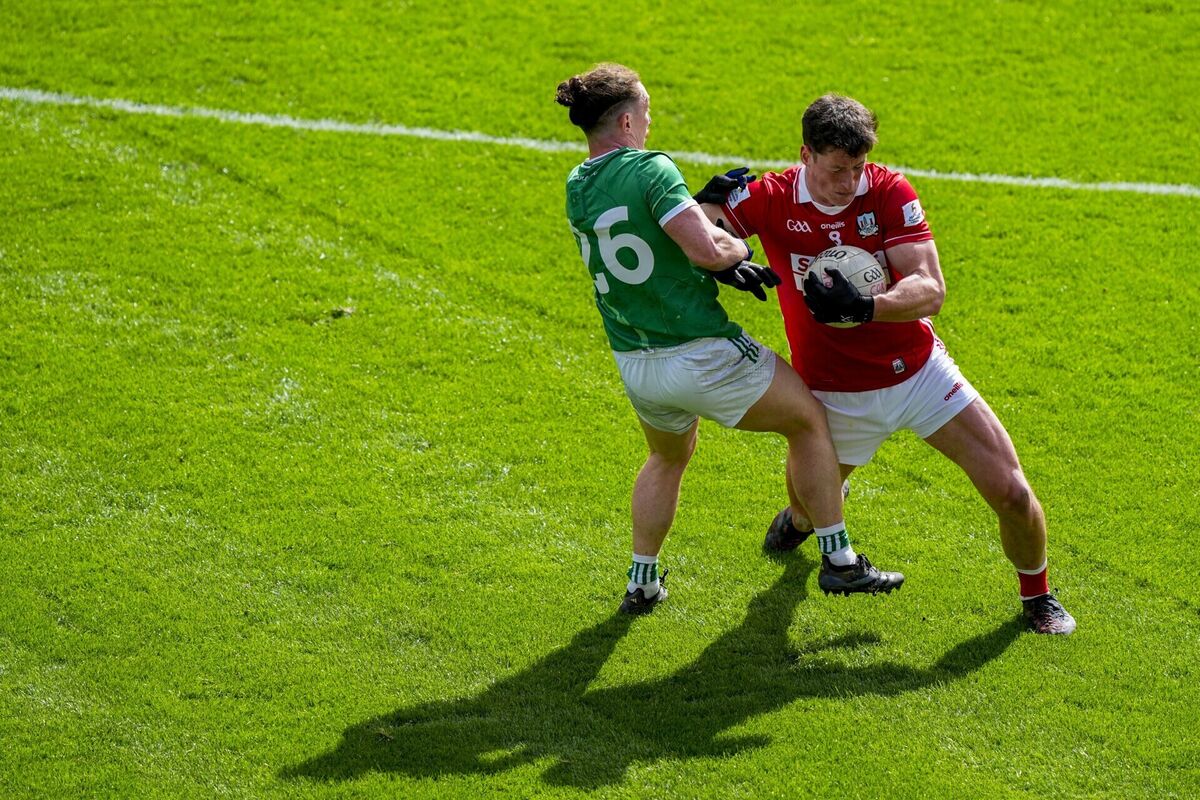 Colm O'Callaghan of Cork and Peter Nash in action. Picture: INPHO/James Lawlor