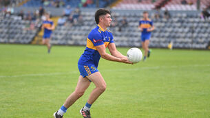 <p>Carrigaline's Darragh King in action against Ballincollig in 2023. Picture: Larry Cummins</p>