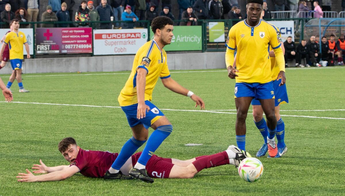 Cobh Ramblers Callum Honohan looks for a penalty as Longford's Pharrell Manuel clears the ball away during the LOI Div 1 match at St Colman's Park. Picture: Howard Crowdy