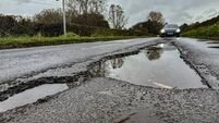 Potentially tyre-ripping potholes on a road in East Sussex 01