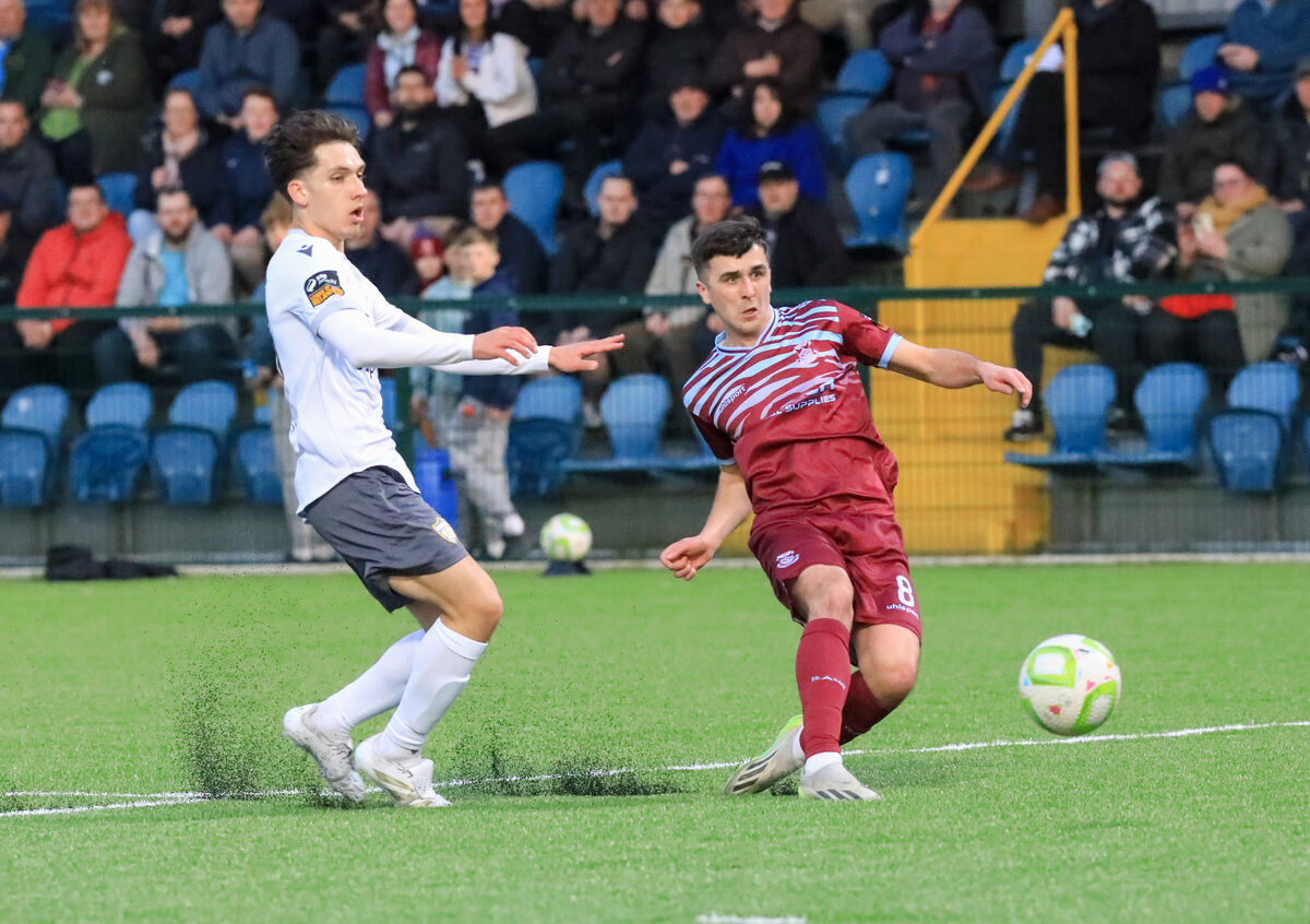 Cobh's Barry Coffey shoots at goal as Wexford's Zayd Abada watches on during the SSE Airtricity First Division game between Cobh Ramblers and Wexford FC at St. Coleman's Park. Picture: David Creedon