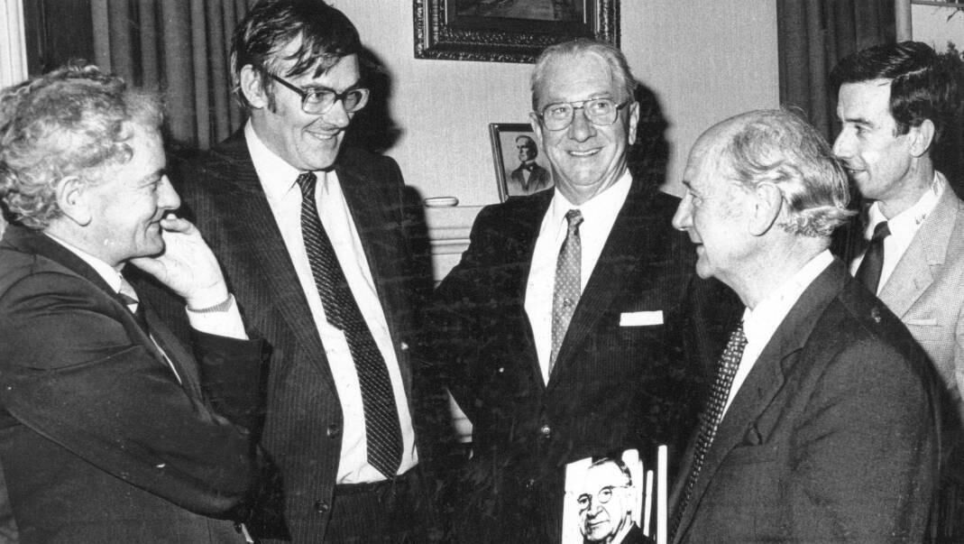 Pictured at the presentation of a specially bound book on Éamon de Valera to Jack Lynch were from the left: Prof John A Murphy, co-author Dr Paddy O'Carroll, co-author Prof Tadhg O'Ciardha, Cork University Press, Jack Lynch, Donal Counihan, Cork University Press.