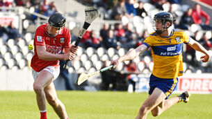 <p>Cork's Conor Noonan tries to get a shot away as Matthew O'Halloran of Clare closes in during Wednesday's Fulfil Munster U20HC clash at SuperValu Páirc Uí Chaoimh. Picture: Eddie O'Hare</p>