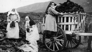 <p class="contextmenu internal_Caption">Benedictine nuns harvest peat near Kylemore Abbey, Connemara, in November, 1936. Picture: Fox Photos/Getty Images</p>