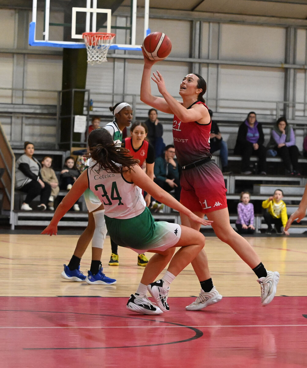 Catalyst Shannon Brady lays up a basket from Liffey Celtics' Aine O'Connor during the Women's Super League at The Fr Mathew Arena Picture: Eddie O'Hare