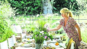 <p class="contextmenu internal_Caption">Clodagh McKenna in her stunning garden in Hampshire, England</p>