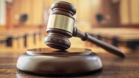 Judges gavel in courtroom legal trial and law background