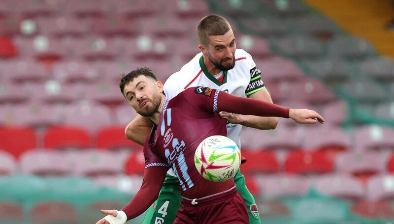 Fiacre Kelleher, Cork City, tussles with Dylan McGlade, Cobh Ramblers. Picture: Jim Coughlan.
