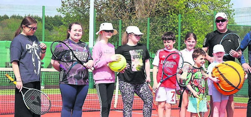 Participants and helpers enjoying the visually impaired tennis programme at Douglas Lawn Tennis Club on Saturday.