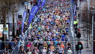 Participants in the The Dublin City Half Marathon make their way down O'Connell Street 30/3/2025