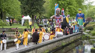 <p>The opening procession of Cork’s first-ever Mela festival at Fitzgerald Park. Picture: Gerard McCarthy</p>