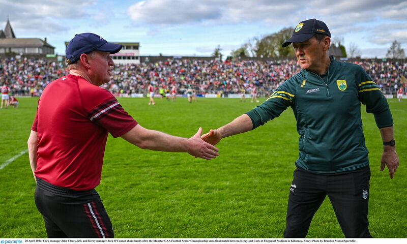 Cork boss John Cleary and Kerry manager Jack O'Connor shake hands in 2024. Picture: Brendan Moran/Sportsfile