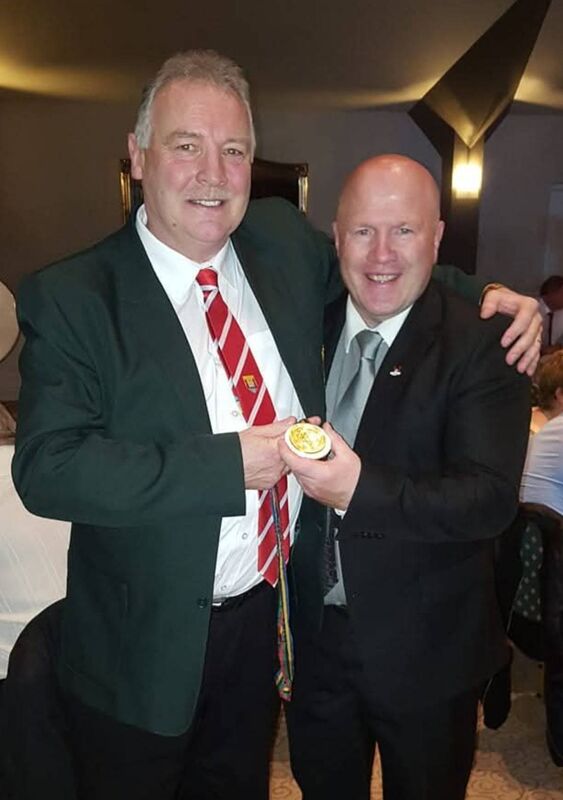 Conal Thomas, admires Michael Carruth's Olympic Gold medal. Cork 