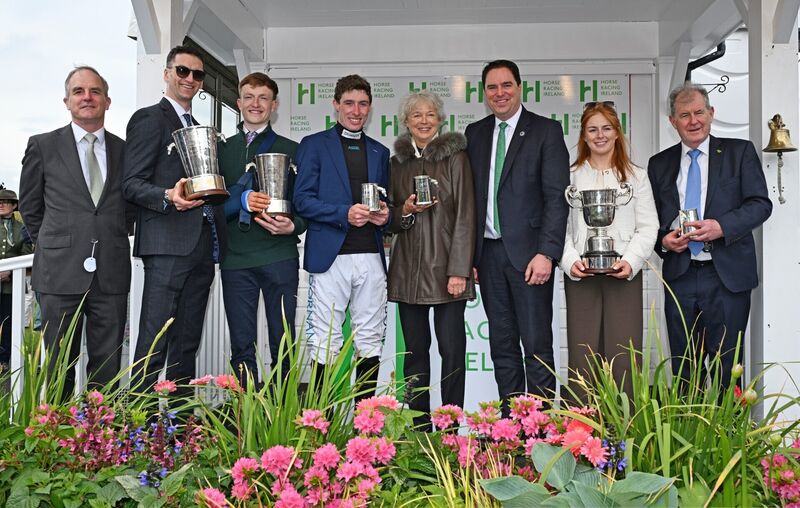 2025/2026 NH Champions (left to right) Joe Osborne, Patrick Mullins (Amateur), Eoin Staples (Conditional) Jack Kennedy (Jockey), Jackie Mullins (rep Trainer Willie), Minister Martin Heydon, Jody Townend (Lady) and JP McManus (Owner) on SBK Festival Finale of the Punchestown Festival