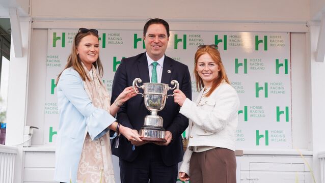 <p>The 2025 / 2026 National Hunt Champions were crowned on the final day of the Punchestown Festival today, pictured is Jody O’Leary, grand niece of Mary Hyde, and Martin Heydon, Minister for Agriculture, Food and the Marine, presenting the champion female amateur award the Mary Hyde Cup to Jody Townend</p>
