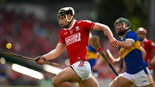 <p>Barry Walsh of Cork surges clear of Tipperary's Robert Doyle during the Munster SHC game in Thurles last month. Picture: Brendan Moran/Sportsfile</p>