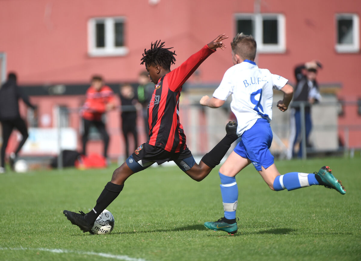 Jaden Umeh, Ringmahon Rangers shoots against Blarney United. Jaden Umeh, Ringmahon Rangers shoots against Blarney United.