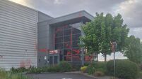 Windows smashed and paint daubed at Cork site as group targets multinational firm