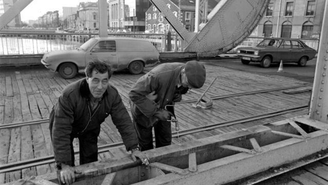 <p>CIE workers repairing railway lines on Clontarf Bridge, Cork, in February, 1978. A Throwback Thursday reader bought a house that year for £14,200, while cars and railways are also remembered in today’s column</p>