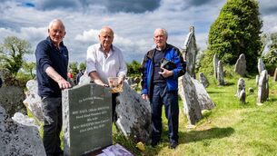 <p>John Arnold with Charlie McAllister (left) and Pat White (right) at the grave of songwriter May Higgins at Templecurraheen graveyard in Carrigtwohill parish, where a ceremony took place this week after its was cleaned up.	<span class="contextmenu emphasis CaptionCredit">Picture: Chani Anderson</span>
            </p>