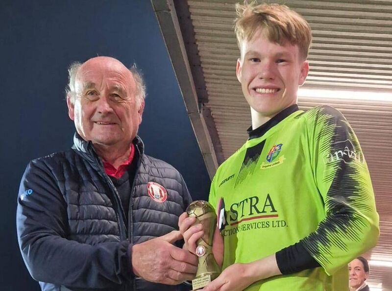 Youth Soccer: Richie Brown (Cork Youth League) presenting the Gary McCarthy Trophies Man of the Match award to keeper Ronan McGrath after the U18 League Cup final at MFA Turner's Cross.