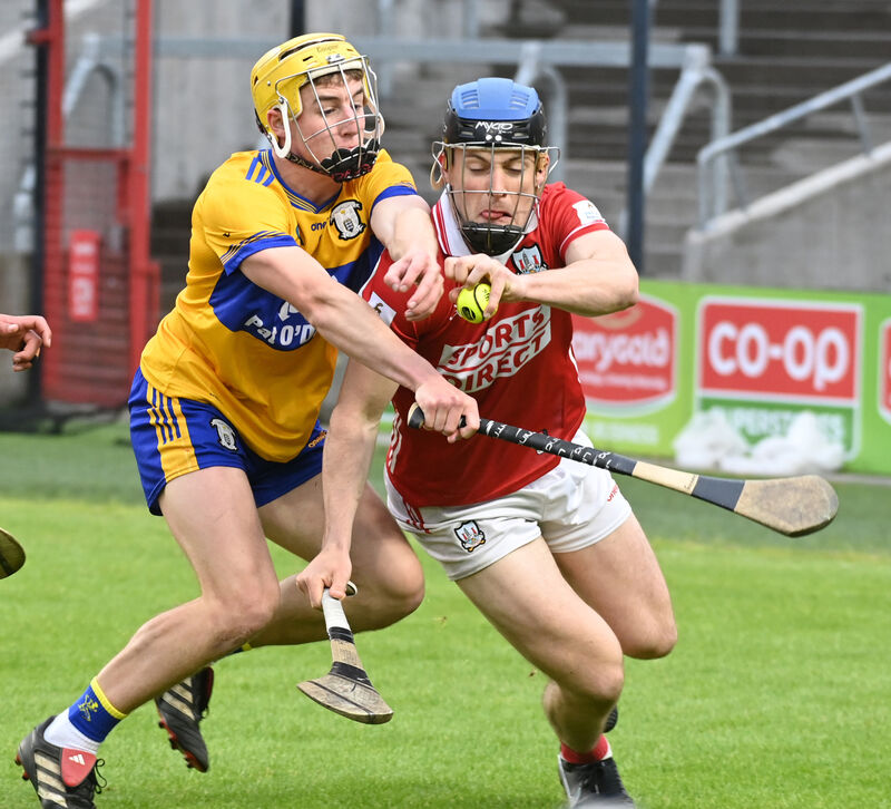 Cork's Barry O'Flynn tussles with Clare's Eoghan Gunning. Picture: Eddie O'Hare