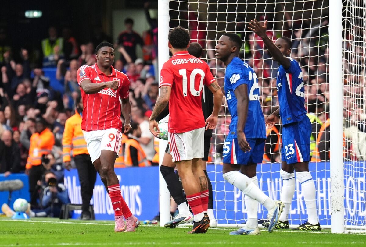 Nottingham Forest's Taiwo Awoniyi (left) celebrates scoring the side's third goal with team-mate Morgan Gibbs-White during the Premier League match at Stamford Bridge, London. Picture: John Walton/PA Wire