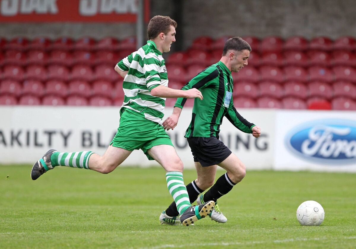 Billy Tabb in action for Mayfield United against Ballincollig's Cian O'Shea in the 2013 Murphy Cup final. Picture: Jim Coughlan.
