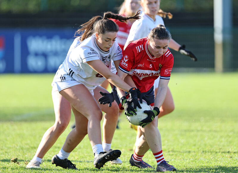 Cork's Melissa Duggan in action against  Mayah Doyle and Laoise Lenehan, Kildare, during their  Lidl Ladies National Football League Division 1 clash at MTU. The Dohenys star was named Player of the Month for April. Picture: Jim Coughlan