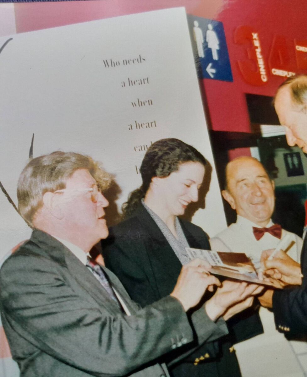 Jack signing autographs for Capitol cinema staff during a visit there. Jack signing autographs for Capitol cinema staff during a visit there.