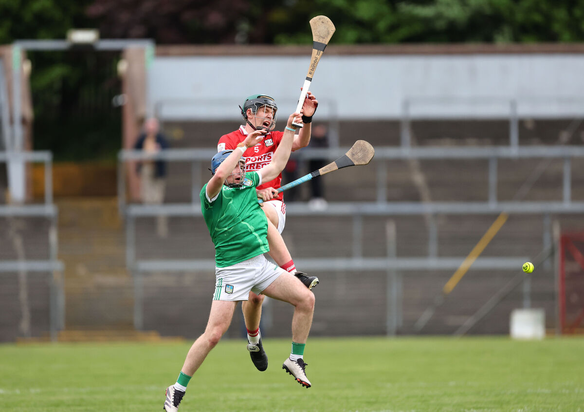 Eoin Considine of Cork and Shane Waters of Limerick contest aerial possession. Picture: Jim Coughlan Eoin Considine of Cork and Shane Waters of Limerick contest aerial possession. Picture: Jim Coughlan